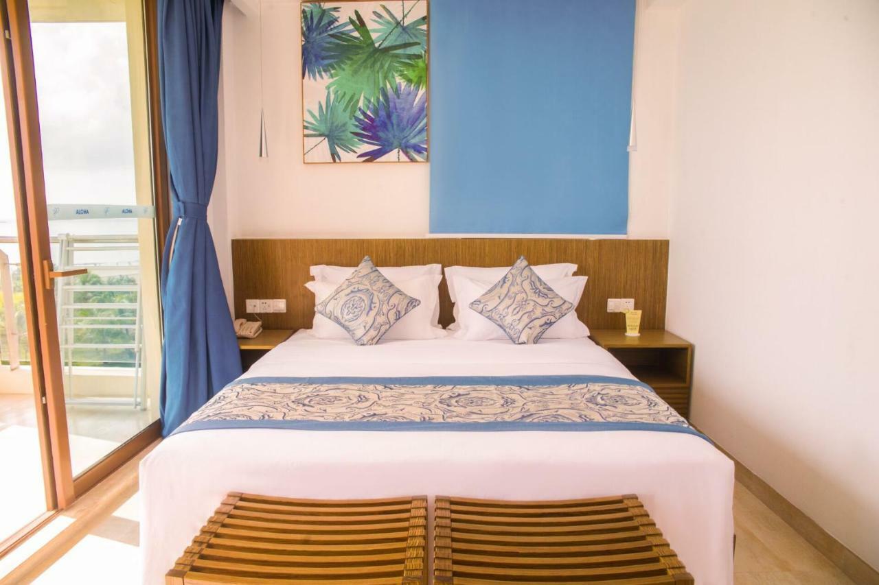 Aloha Oceanfront Suite Resort Lingshui  Room photo